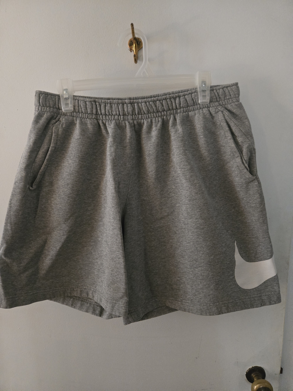 Nike Gray men's Athletic Jersey Shorts with White Swoosh